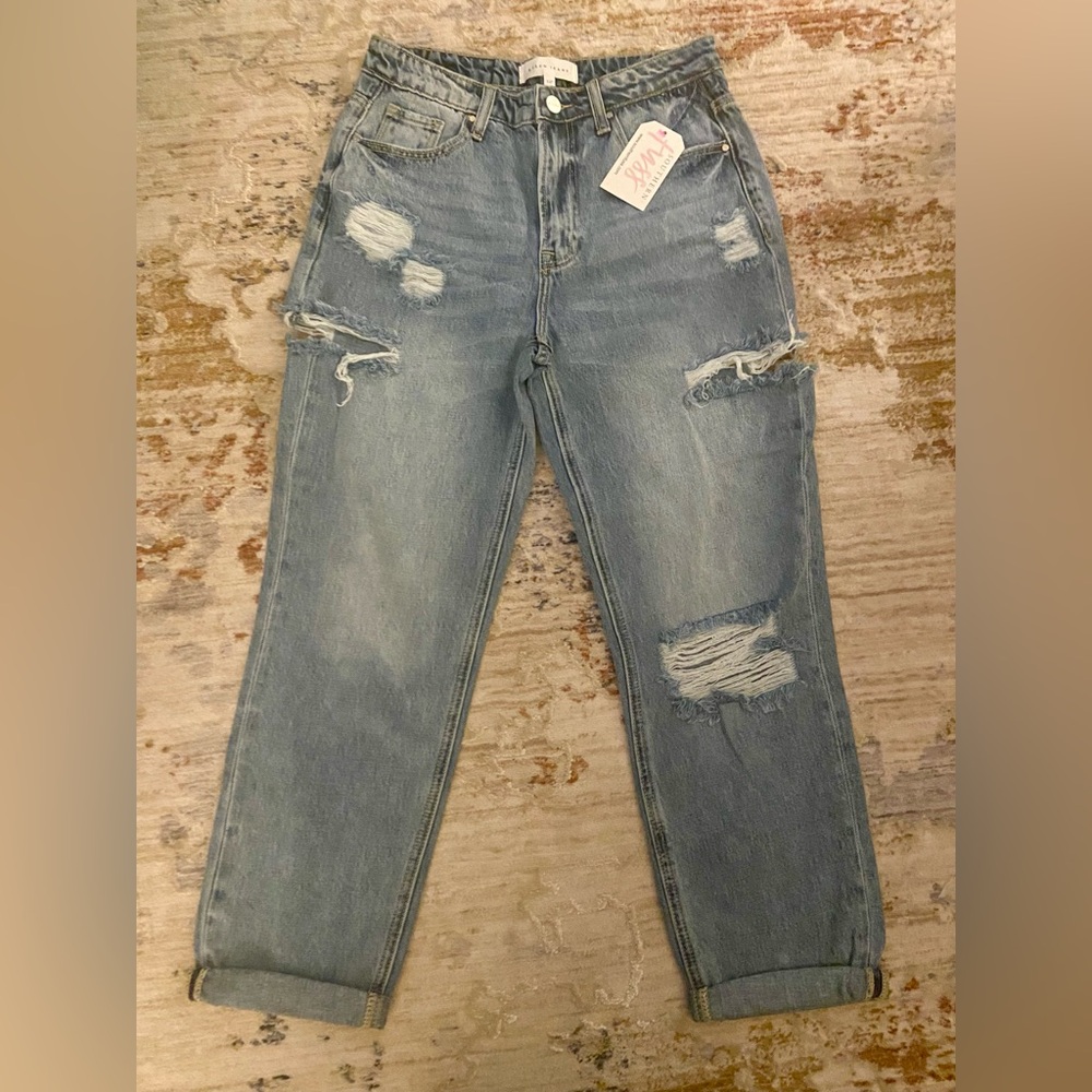 NWT Distressed Risen Jeans!